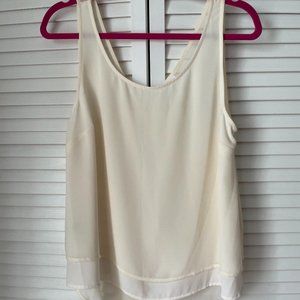 BCBGeneration cream sleeveless blouse size M